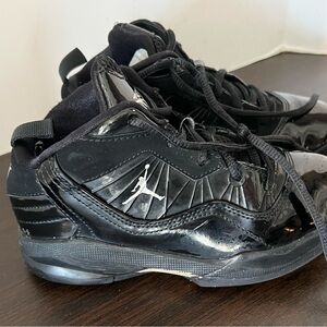 Jordan Black Sneakers with Sleek Design and Supportive Midsole